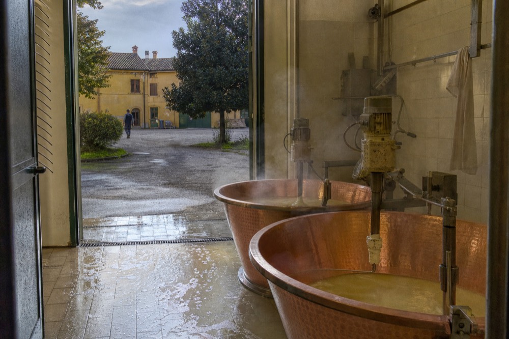 Copper cheesemaking vats inside a Parmigiano Reggiano dairy