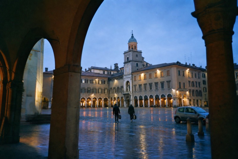 Where to stay section image showing Modena city center streets convenient for joining food tours